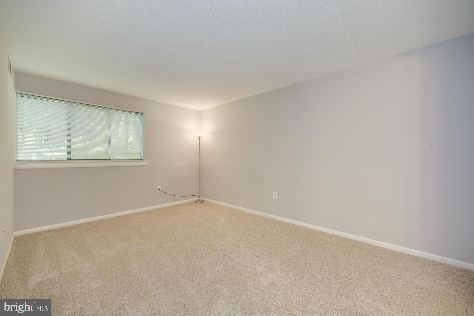 11727 Ledura Court, Unit T2 Reston, VA 20191 - Photo 10 of 18 an empty room with windows