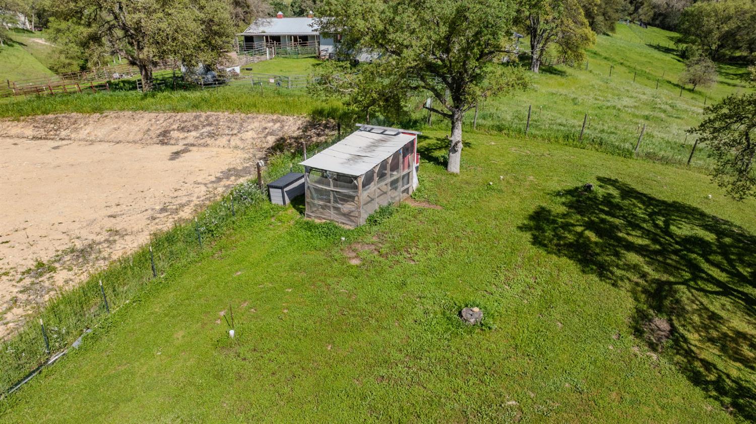 7761 Jenny Lind Road Valley Springs, CA 95252 - Photo 28 of 35 a backyard of a house with table and chairs
