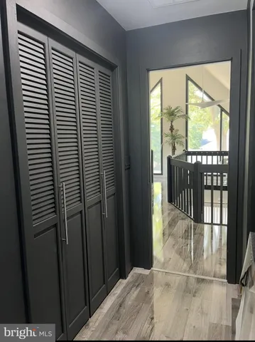 a view of a room that has a large window