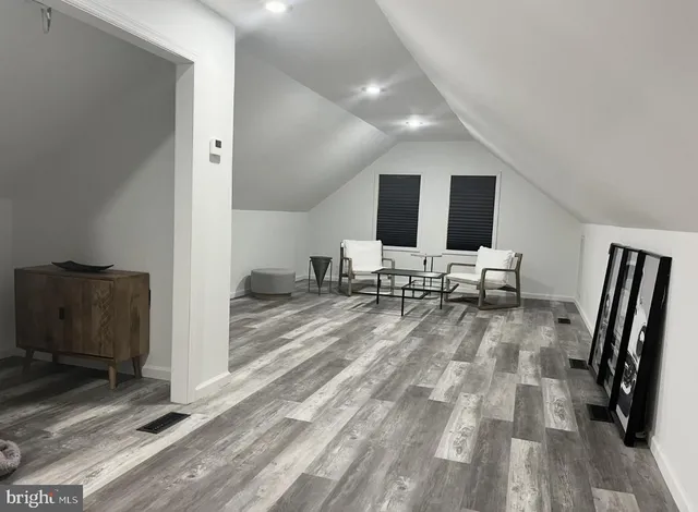 a view of entryway with livingroom and furniture