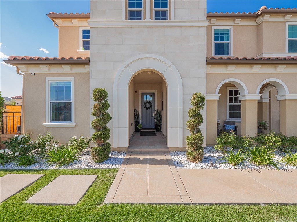 16094 Mariposa Avenue Riverside, CA 92504 - Photo 3 of 72 a front view of a house with garden