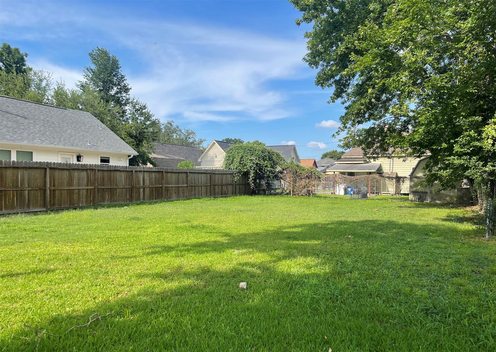 2114 Chestnut Street Houston, TX 77009 - Photo 8 of 8 a view of a garden with a building in the background