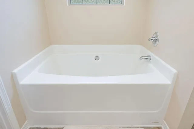 a bathroom with a bathtub
