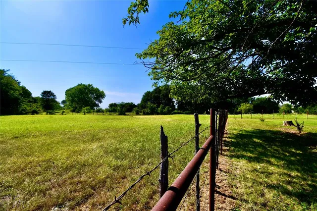a view of swimming pool from a balcony