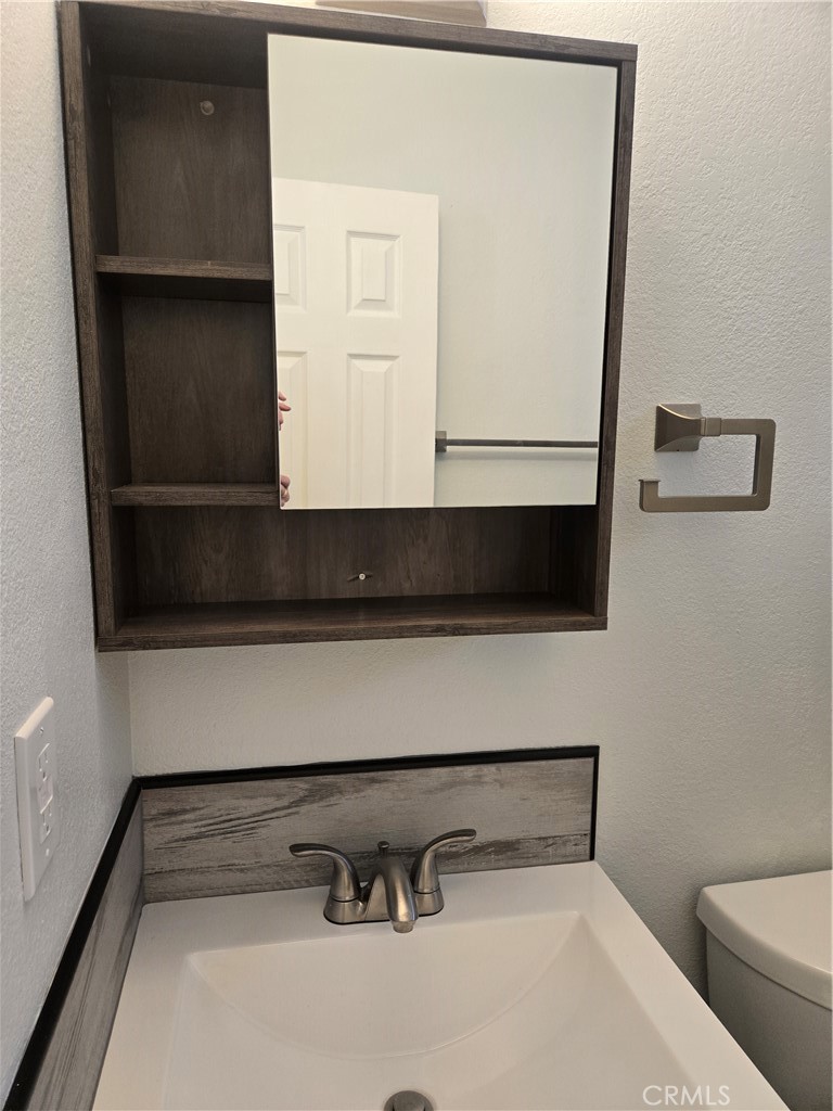 765 Iris Drive, Unit 2 Big Bear Lake, CA 92315 - Photo 6 of 7 a view of bathroom with a toilet