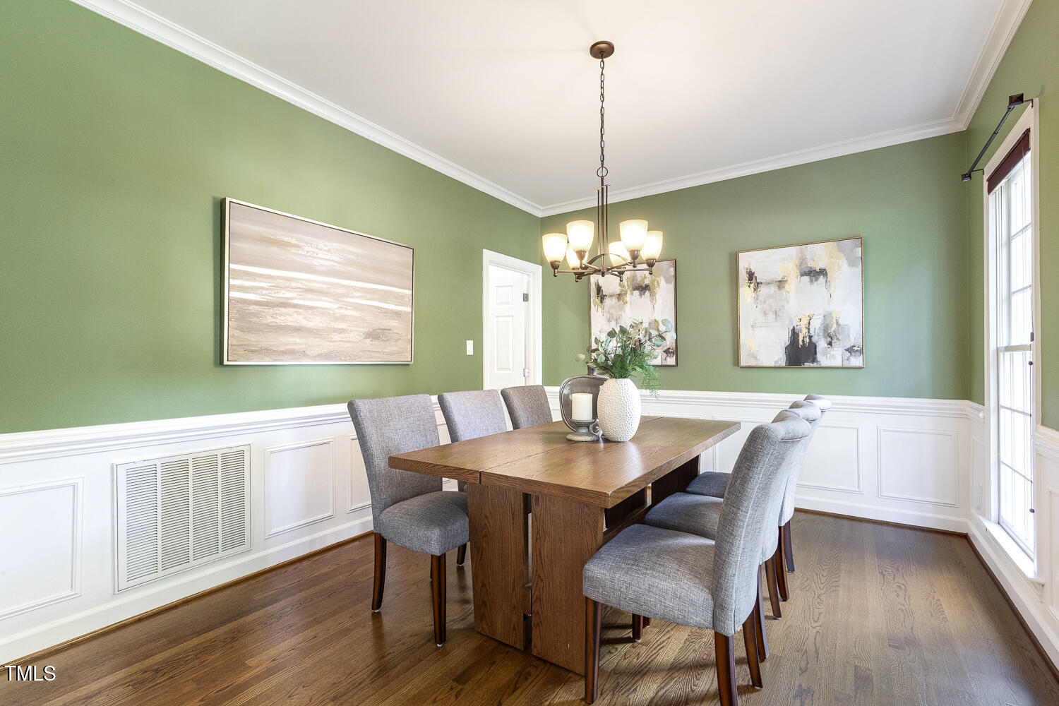 110 Felspar Way Cary, NC 27518 - Photo 9 of 71 a view of a dining room with furniture window and wooden floor