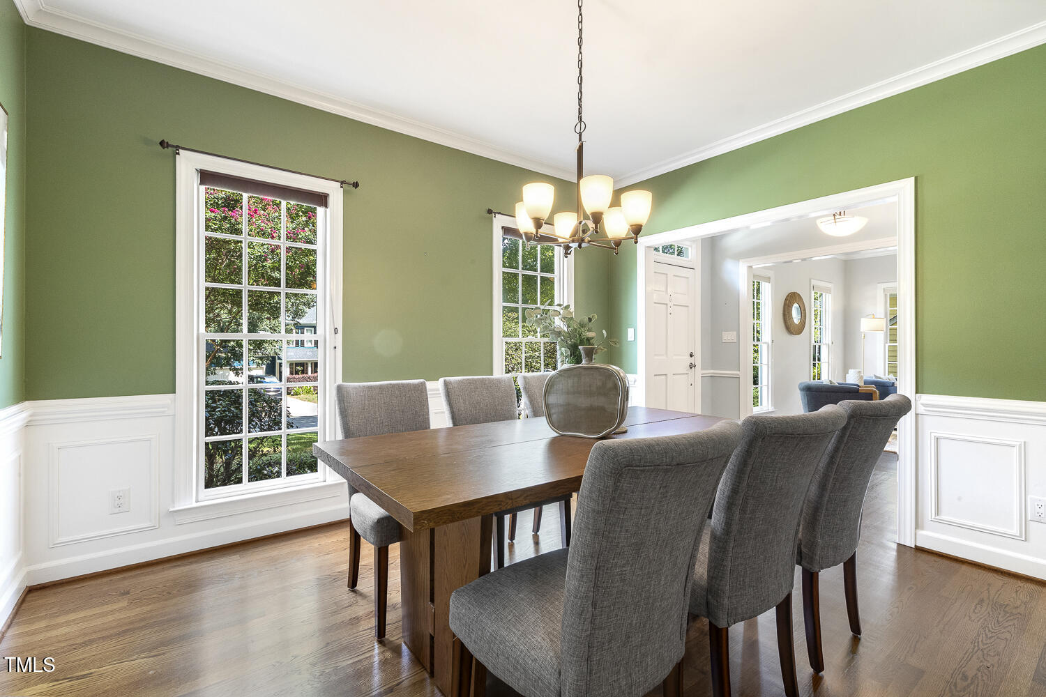 110 Felspar Way Cary, NC 27518 - Photo 10 of 71 a view of a dining room with furniture window and wooden floor