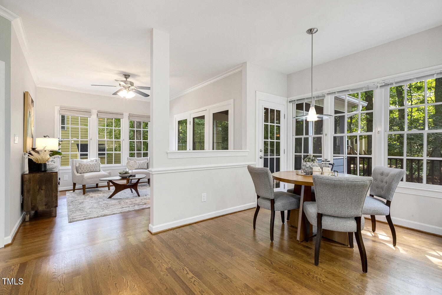 110 Felspar Way Cary, NC 27518 - Photo 20 of 71 a view of a dining room with furniture window and wooden floor
