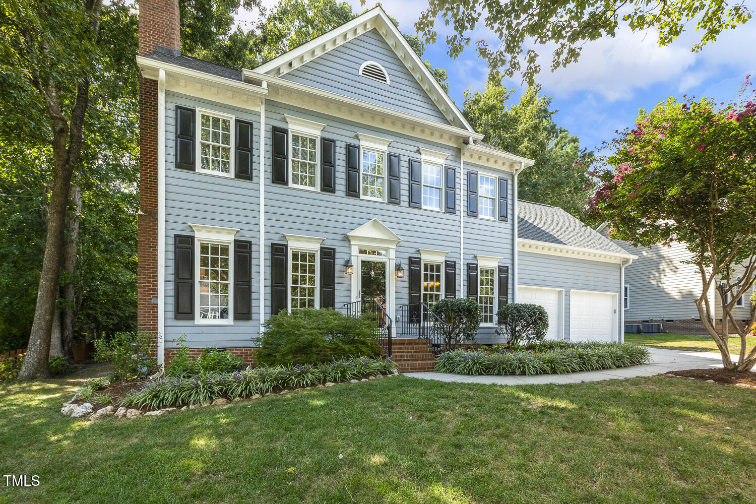 110 Felspar Way Cary, NC 27518 - Photo 2 of 71 a front view of a house with a yard and trees
