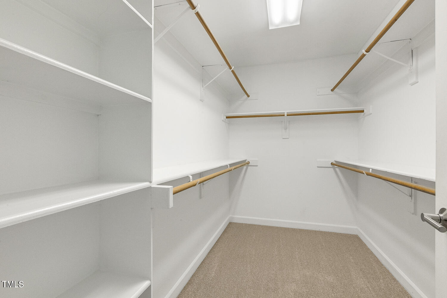 110 Felspar Way Cary, NC 27518 - Photo 31 of 71 a view of an empty walk in closet