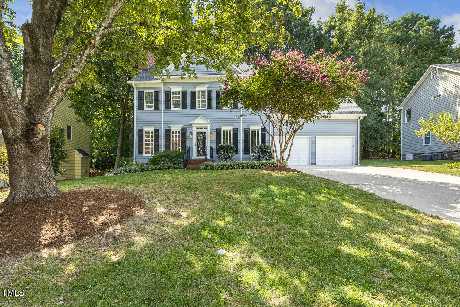 110 Felspar Way Cary, NC 27518 - Photo 3 of 71 a front view of a house with a garden