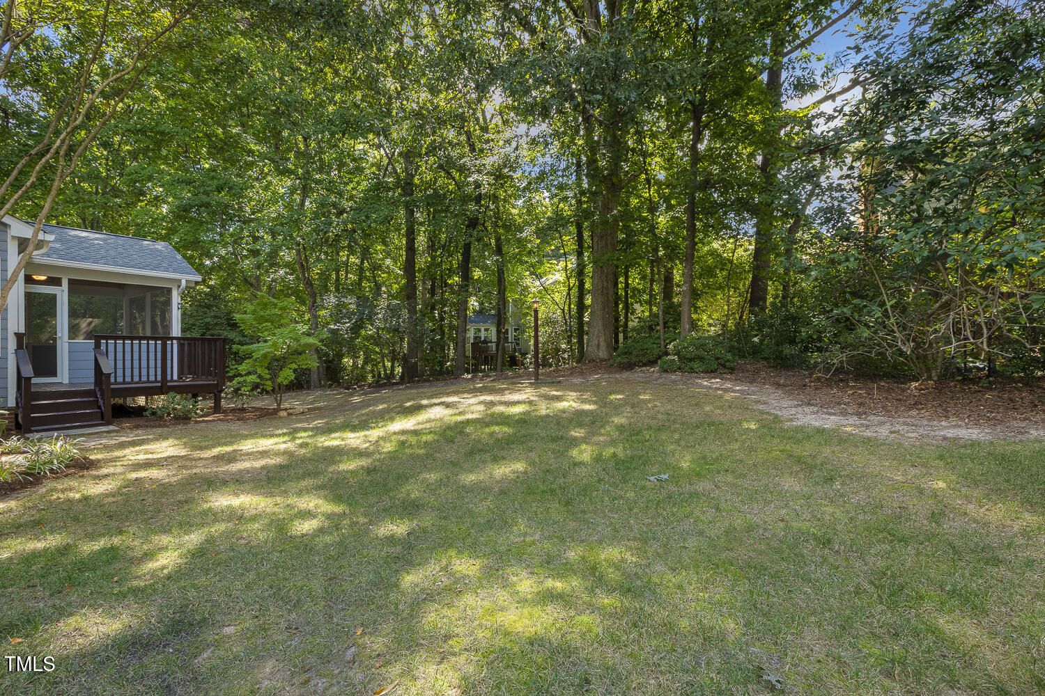 110 Felspar Way Cary, NC 27518 - Photo 56 of 71 a view of a backyard with large trees