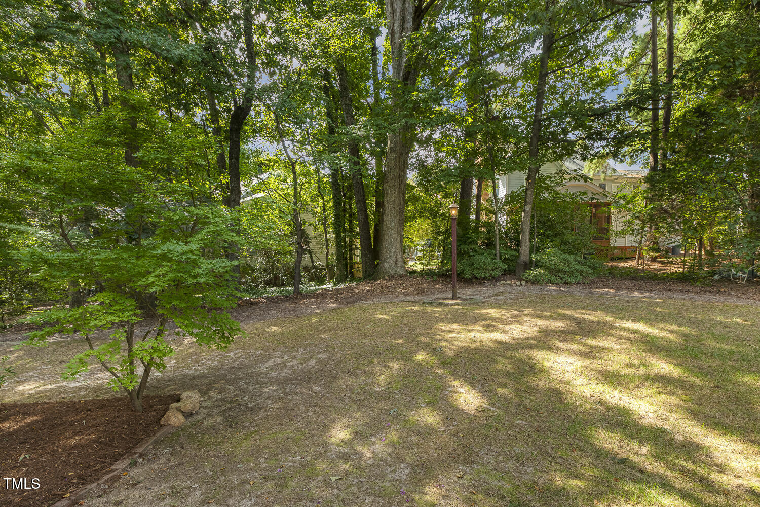 110 Felspar Way Cary, NC 27518 - Photo 57 of 71 a view of a yard with a trees