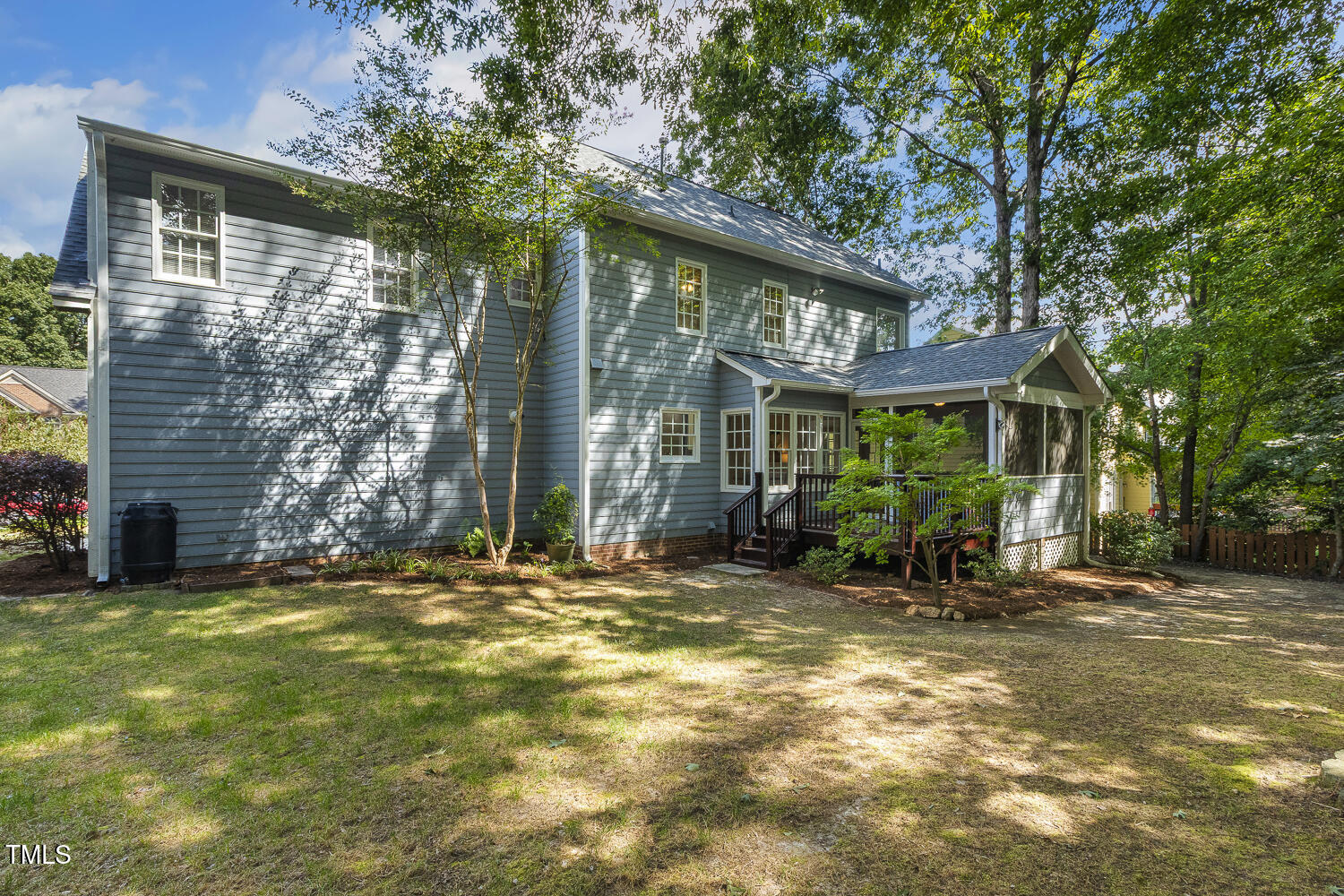 110 Felspar Way Cary, NC 27518 - Photo 58 of 71 a backyard of a house with table and chairs