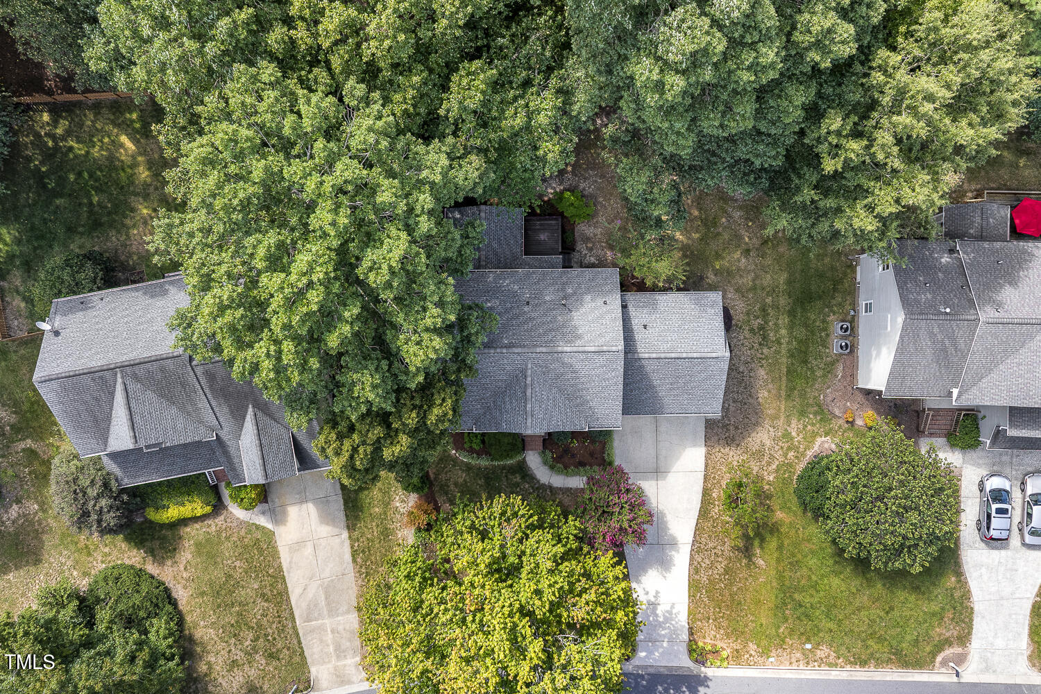 110 Felspar Way Cary, NC 27518 - Photo 60 of 71 an aerial view of a house with swimming pool and garden
