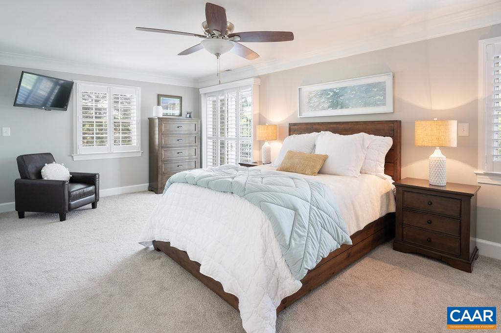 25 Bolling Circle Palmyra, VA 22963 - Photo 18 of 45 a spacious bedroom with a bed and a couch