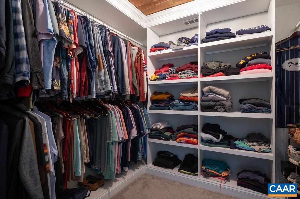 25 Bolling Circle Palmyra, VA 22963 - Photo 22 of 45 a view of walk in closet with clothes and shoes