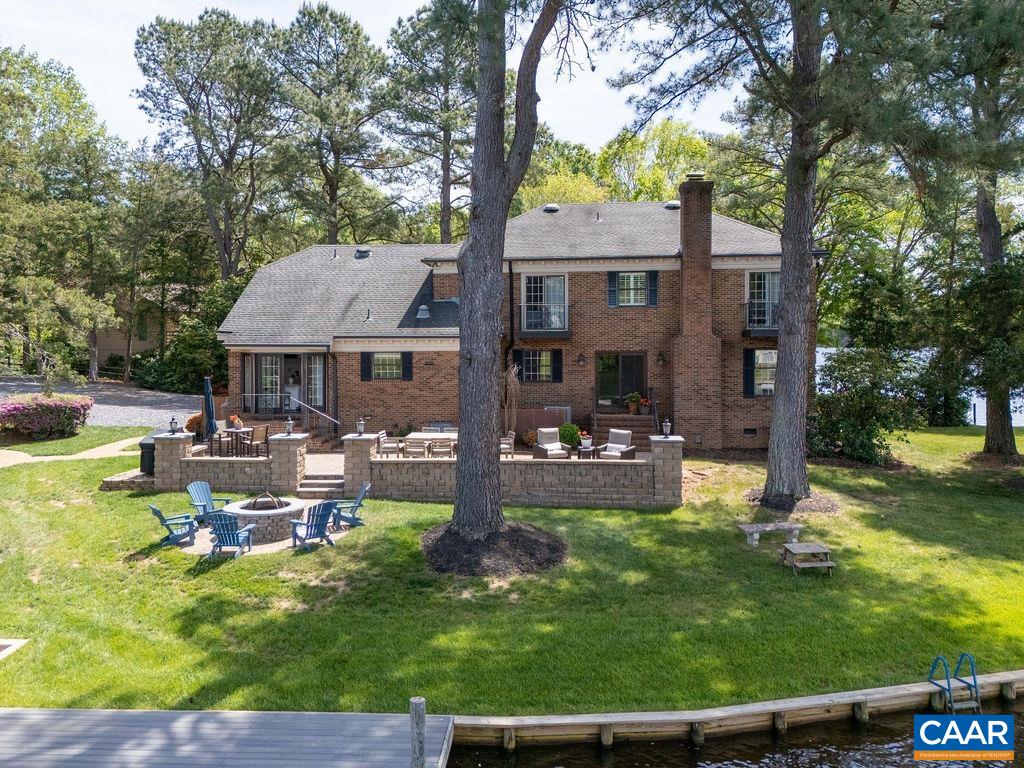 25 Bolling Circle Palmyra, VA 22963 - Photo 31 of 45 a front view of a house with garden and sitting area