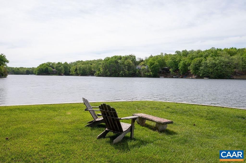25 Bolling Circle Palmyra, VA 22963 - Photo 35 of 45 a view of a lake with outdoor seating and a lake view