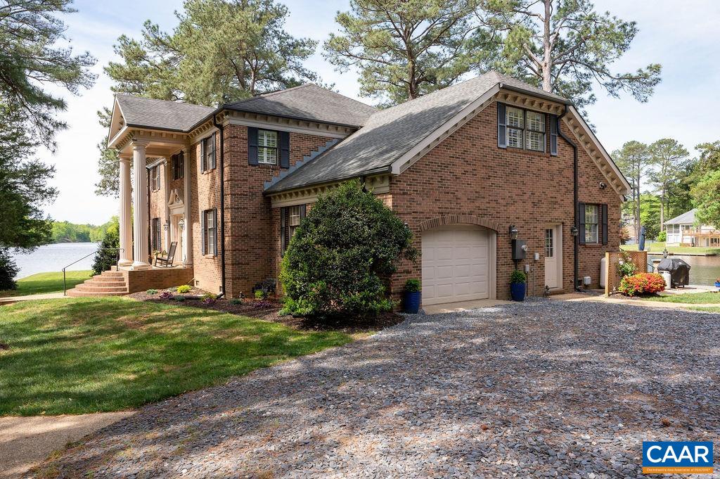 25 Bolling Circle Palmyra, VA 22963 - Photo 37 of 45 a front view of a house with a yard