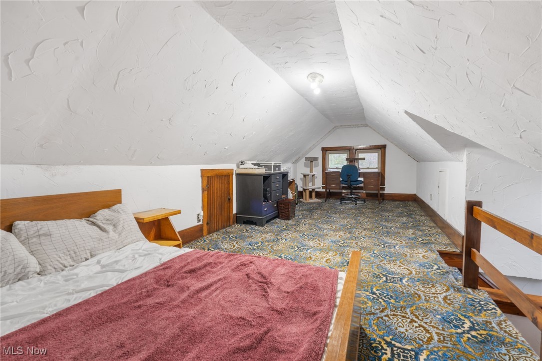 3006 Pontius Road Uniontown, OH 44685 - Photo 20 of 29 Bedroom with carpet flooring and lofted ceiling