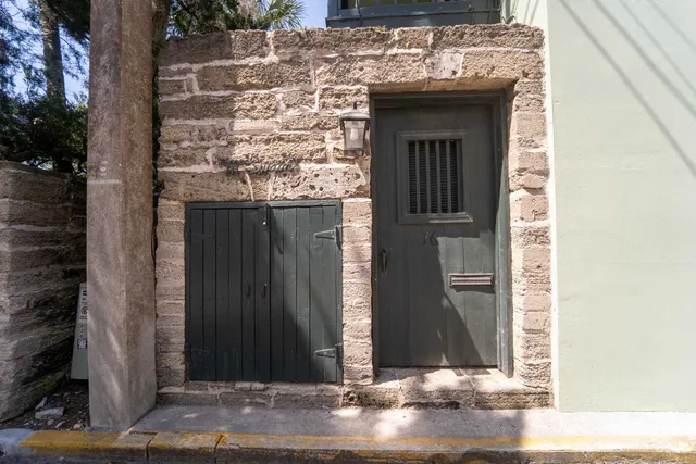 a backyard of a house with lots of trees