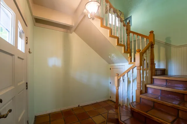 a view of a livingroom with furniture and window