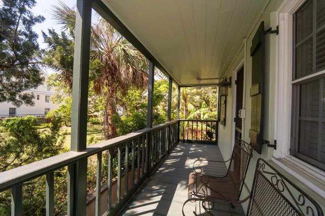 a view of balcony and wooden floor