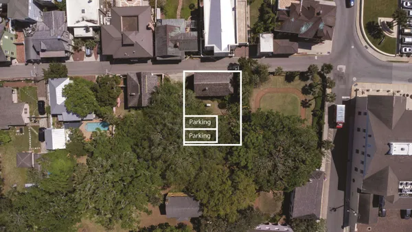 a view of a backyard of the house
