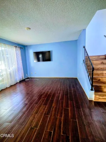 a view of kitchen with wooden floor