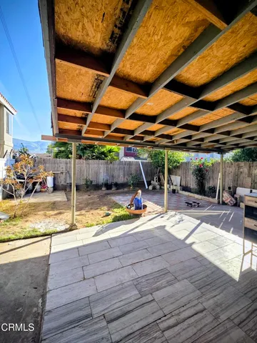 a view of a swimming pool with a patio