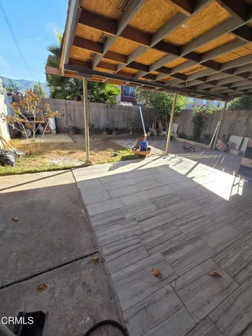 a view of a backyard of a house