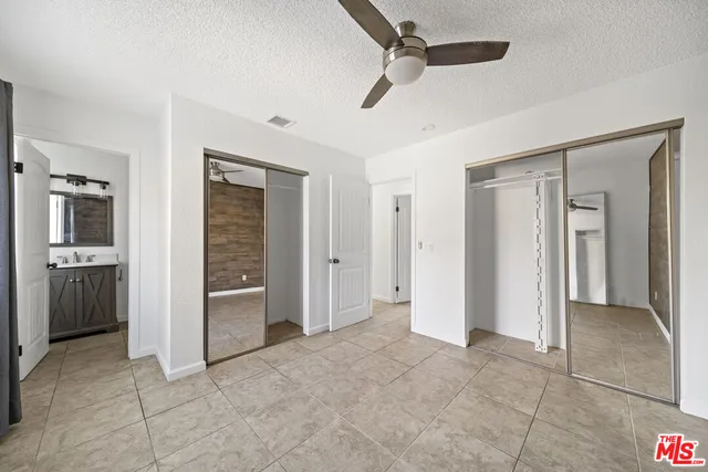 wooden floor and closet in a room