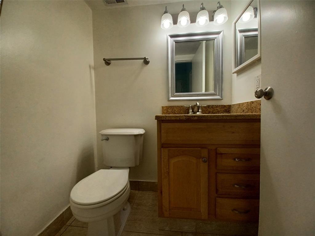 301 North Pine Island Road, Unit 216 Plantation, FL 33324 - Photo 12 of 14 a bathroom with a sink and a toilet