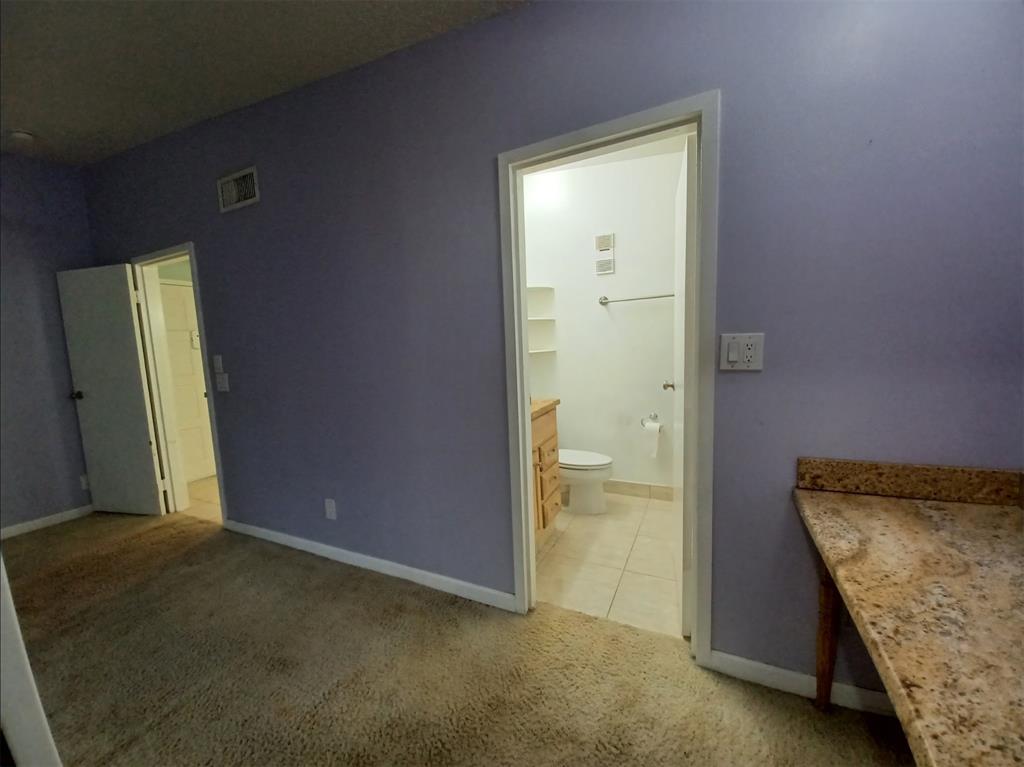 301 North Pine Island Road, Unit 216 Plantation, FL 33324 - Photo 7 of 14 an empty room with mirror