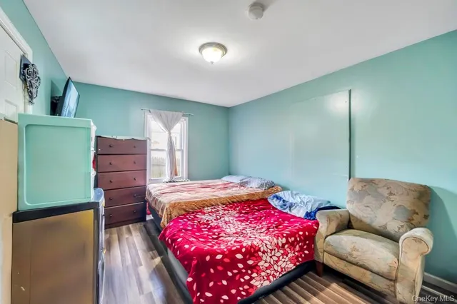 a bedroom with a bed and furniture