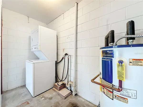 a view of storage and utility room with washer and dryer
