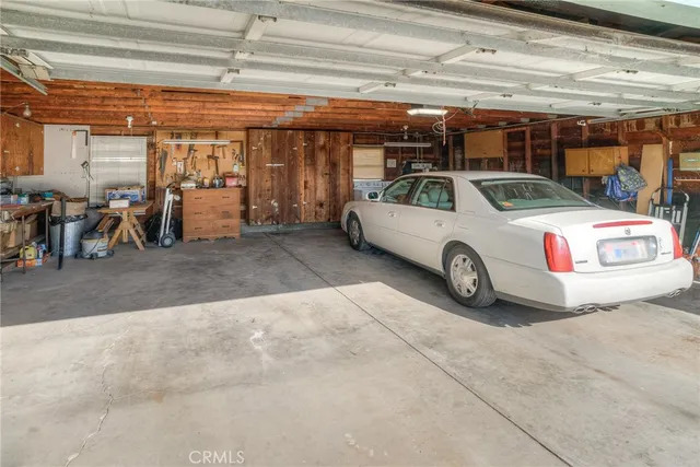 a car and bike parked in a parking
