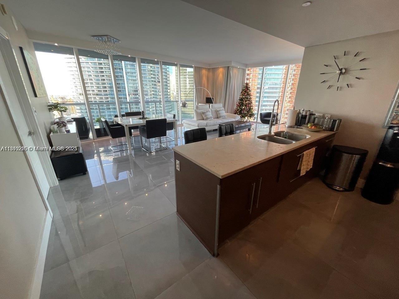 Icon Brickell Miami, FL 33131 - Photo 10 of 12 a large kitchen with lots of counter space