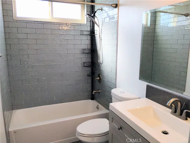 a bathroom with a sink and a bathtub