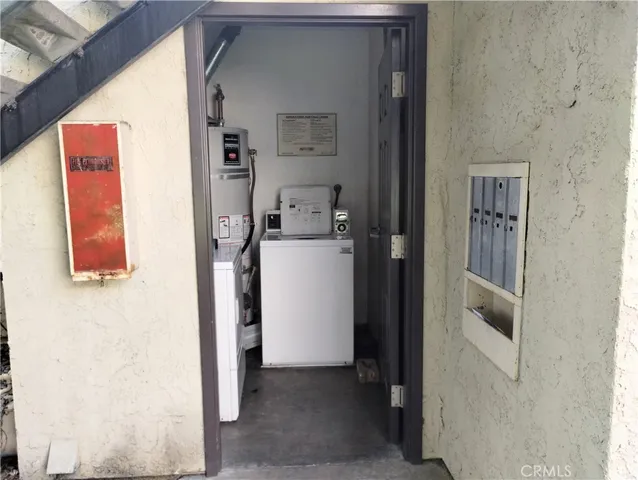 a view of parking with cars and parked cars