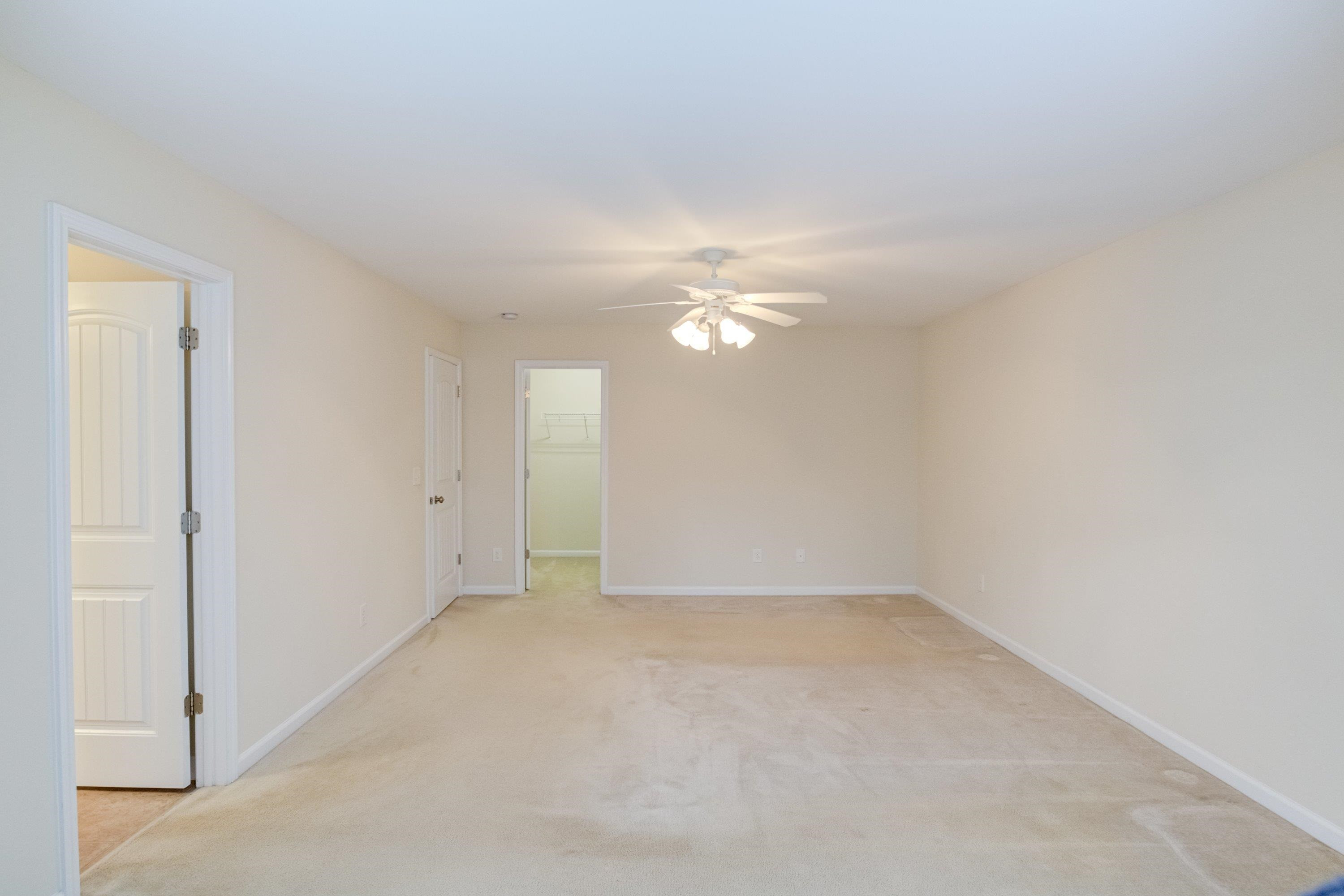 409 Birchrun Drive Durham, NC 27712 - Photo 34 of 49 a view of an empty room with a fan