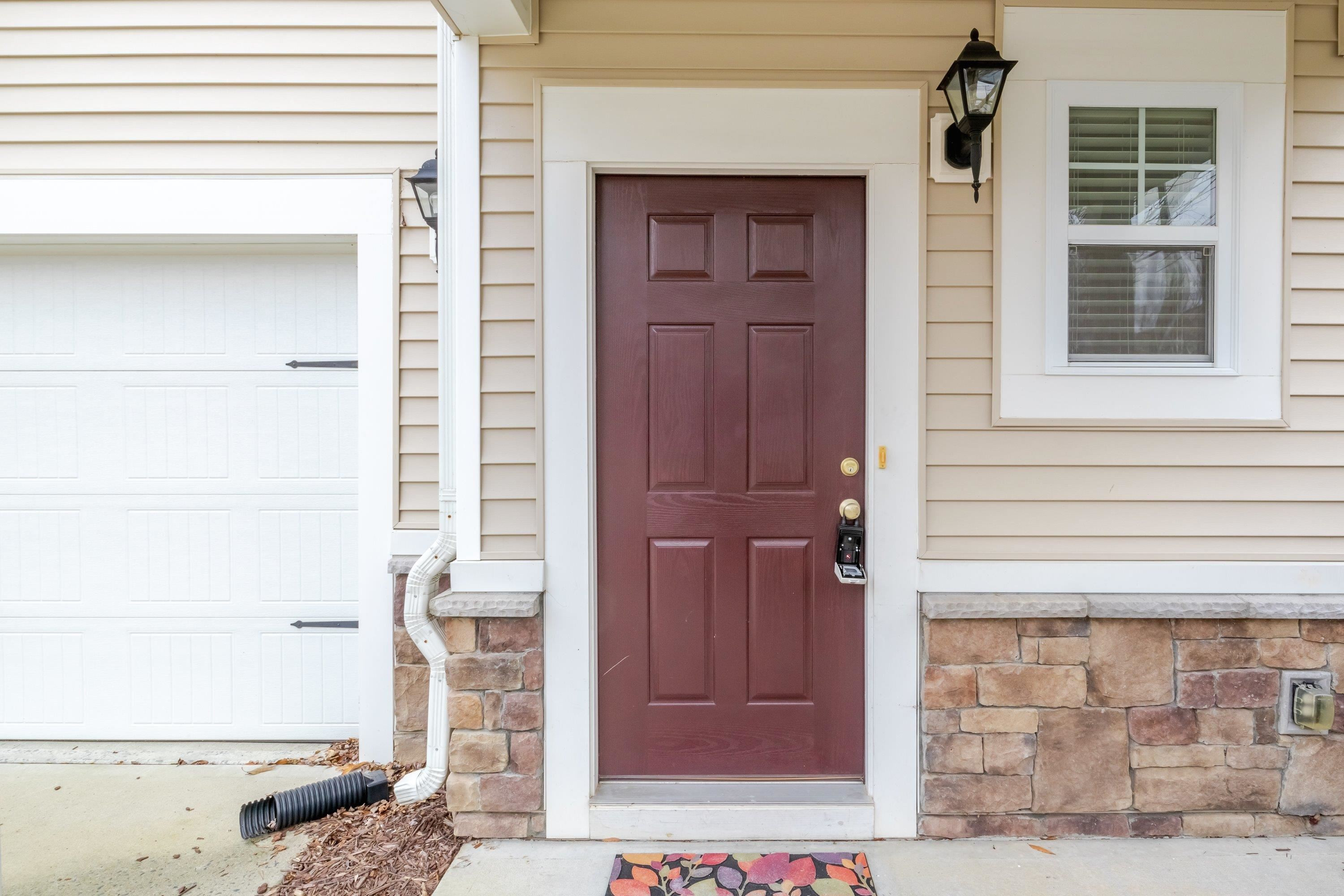 409 Birchrun Drive Durham, NC 27712 - Photo 4 of 49 a view of front door of house