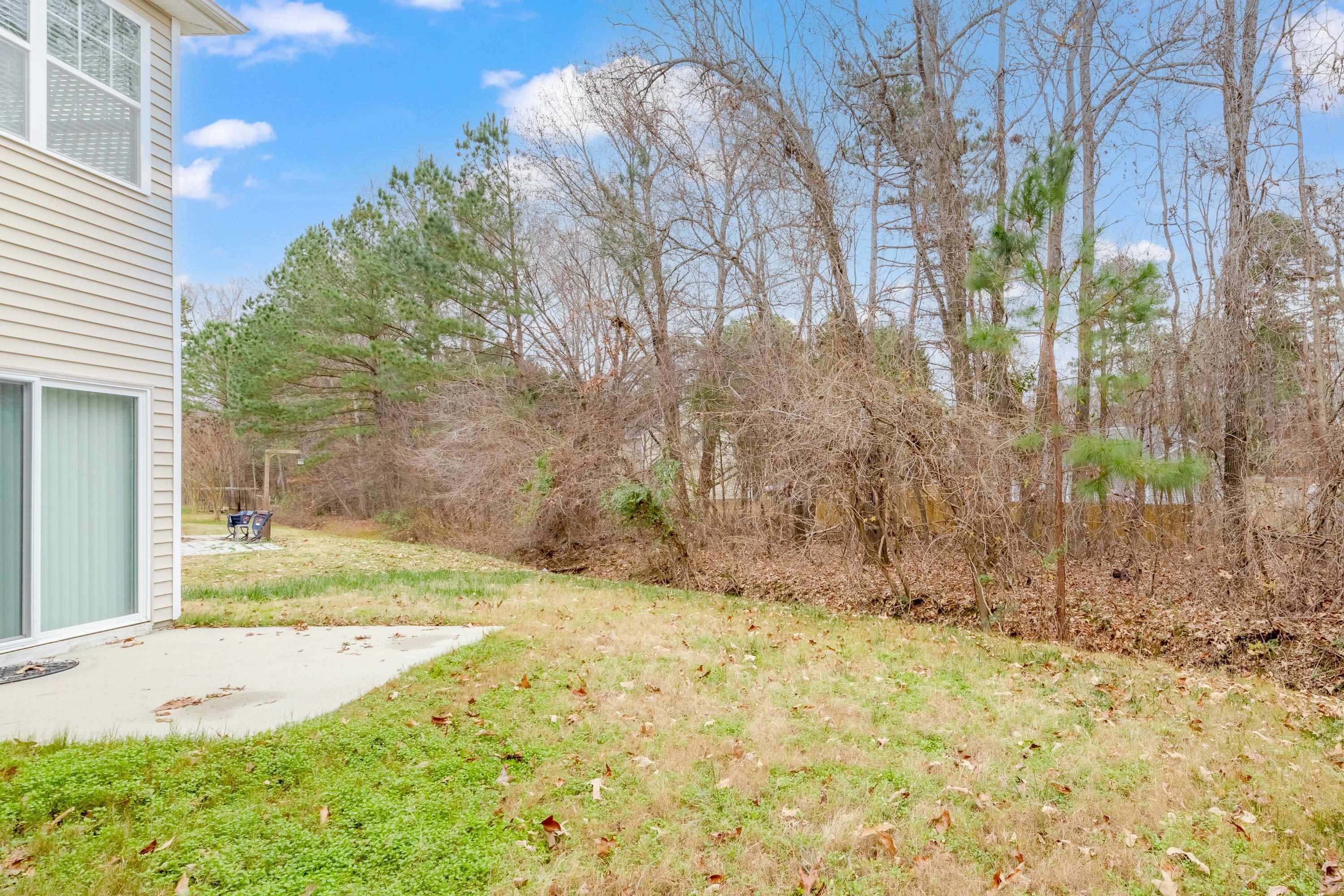 409 Birchrun Drive Durham, NC 27712 - Photo 48 of 49 a view of backyard with outdoor space
