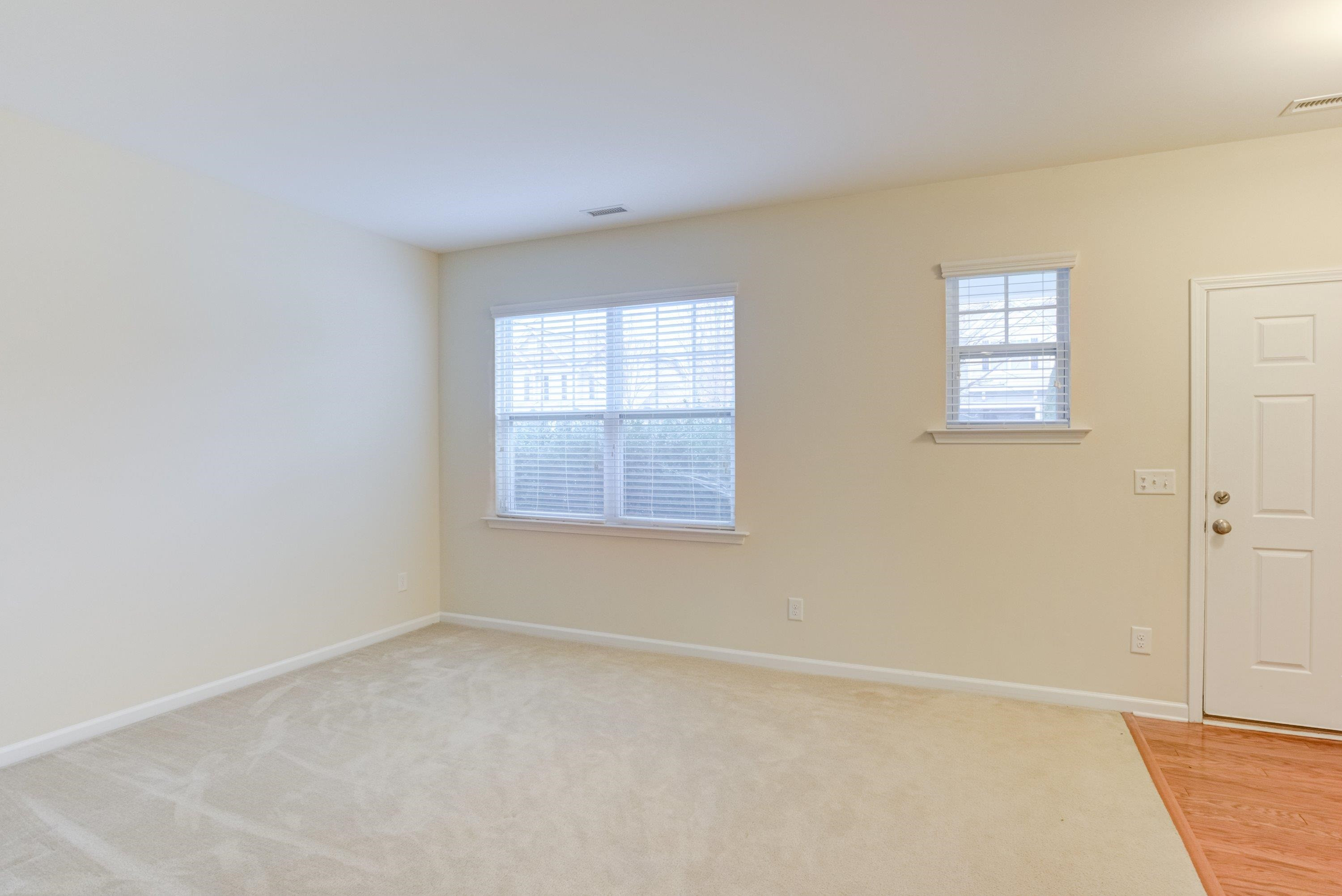 409 Birchrun Drive Durham, NC 27712 - Photo 5 of 49 an empty room with windows