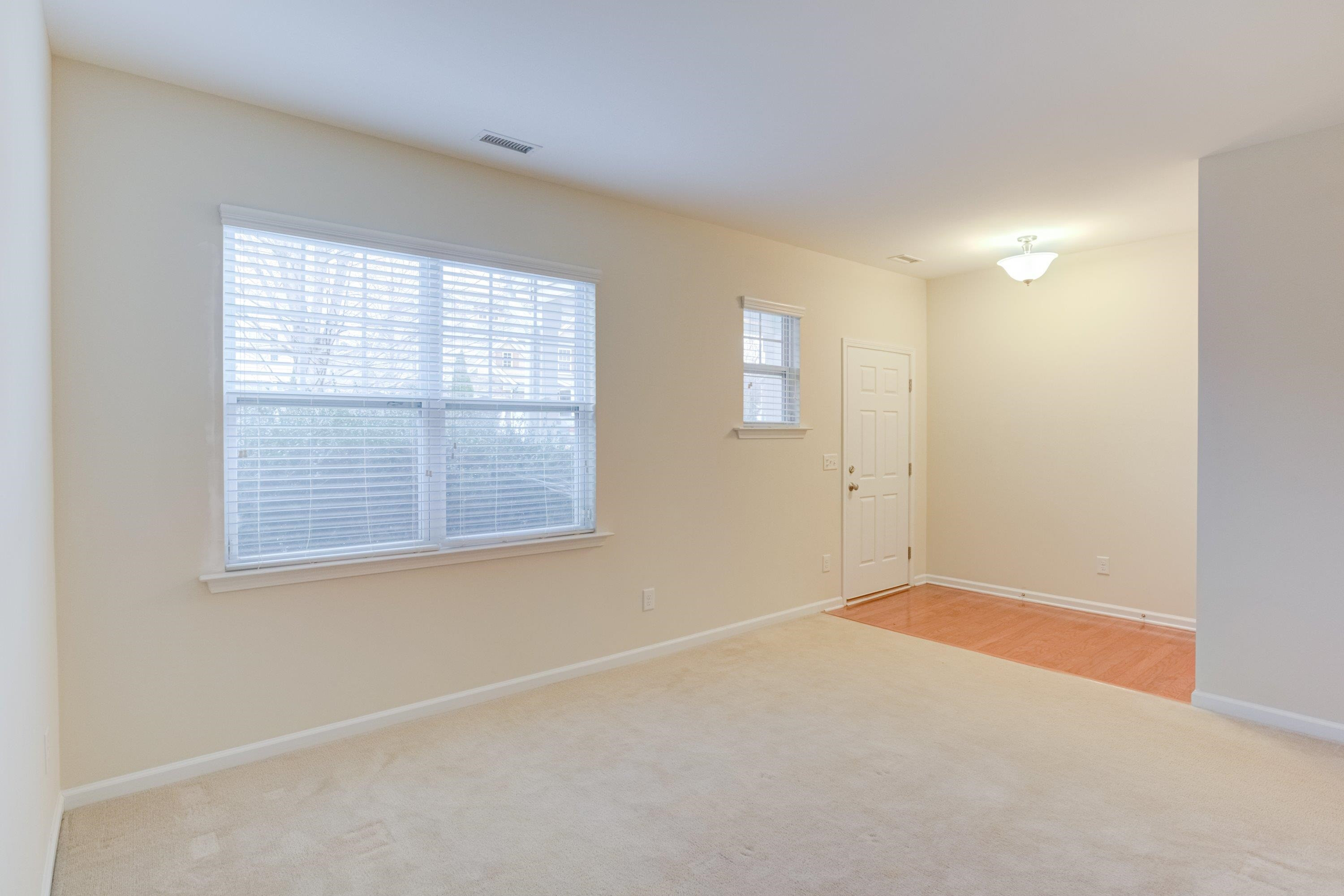 409 Birchrun Drive Durham, NC 27712 - Photo 6 of 49 an empty room with a window