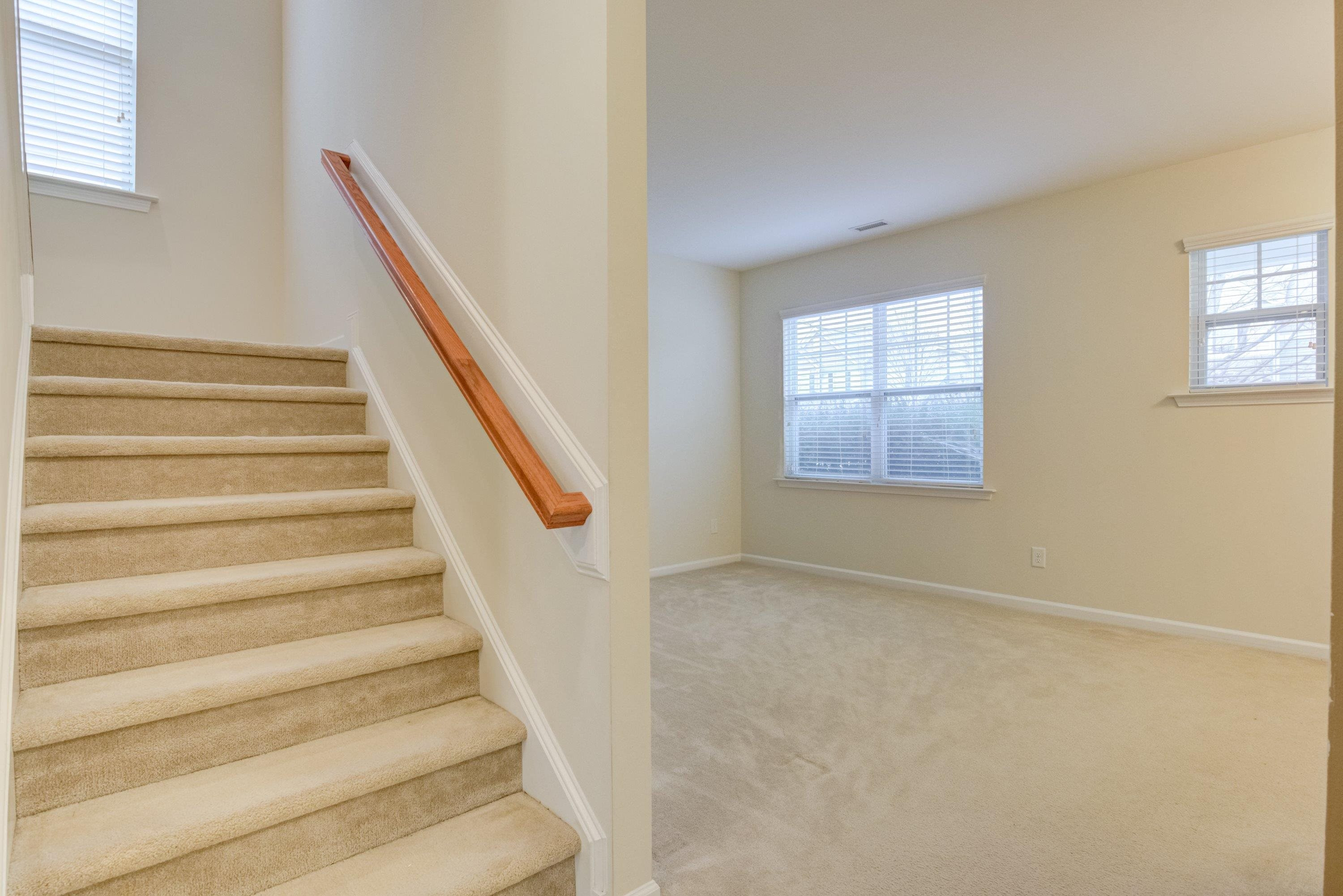 409 Birchrun Drive Durham, NC 27712 - Photo 9 of 49 a view of an entryway with staircase