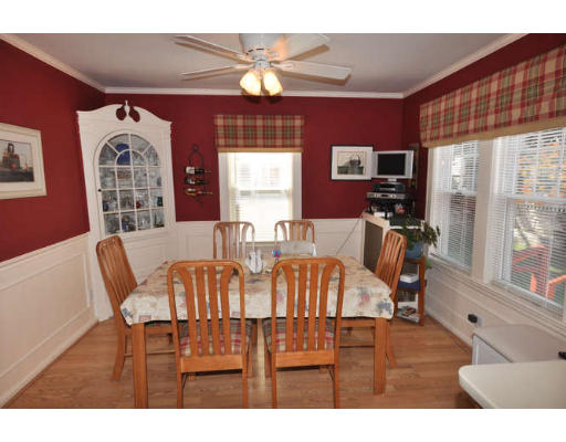 39 Inverness Road Arlington, MA 02476 - Photo 12 of 19 a view of a dining room with furniture and chandelier