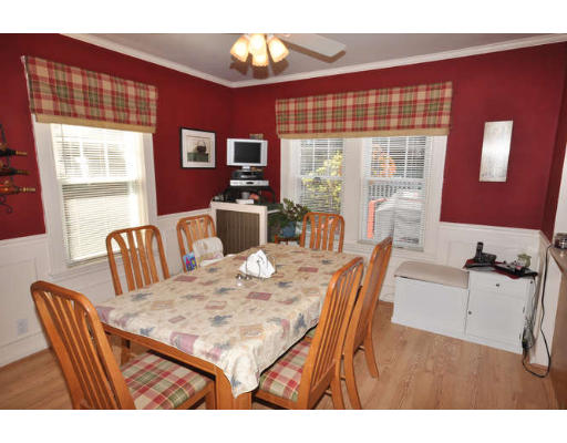 39 Inverness Road Arlington, MA 02476 - Photo 6 of 19 a view of a dining room with furniture