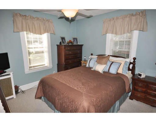 39 Inverness Road Arlington, MA 02476 - Photo 7 of 19 a bedroom with a bed and window